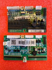 Front of old and new MPPT controller boards prior to cleaning.jpg